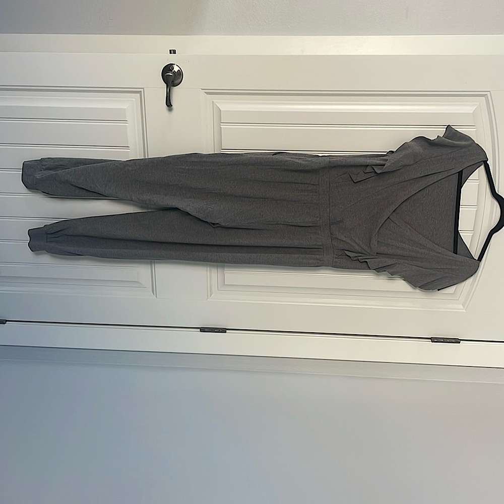 Brand New Grey Ruffled Jumpsuit with Side pockets, Tie waist and cuffed bottom